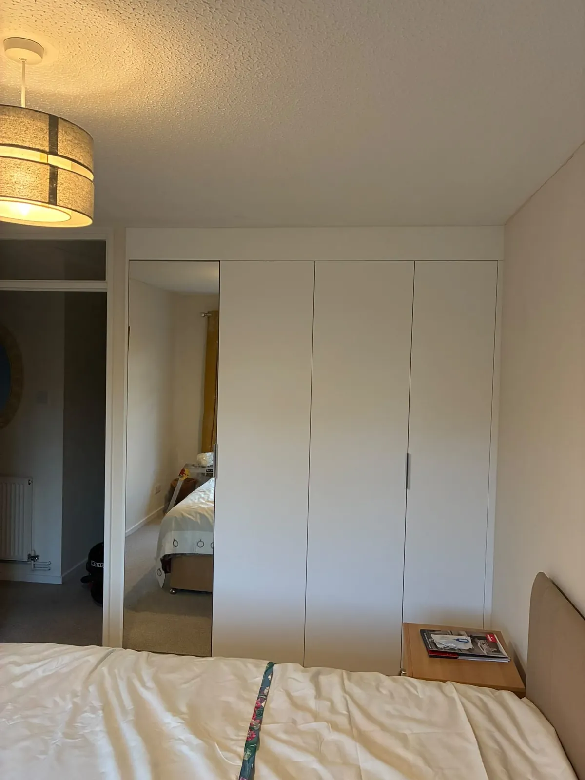 White fitted wardrobes mirror door – bespoke furniture & wardrobes by JCK Carpentry & Building, Exeter