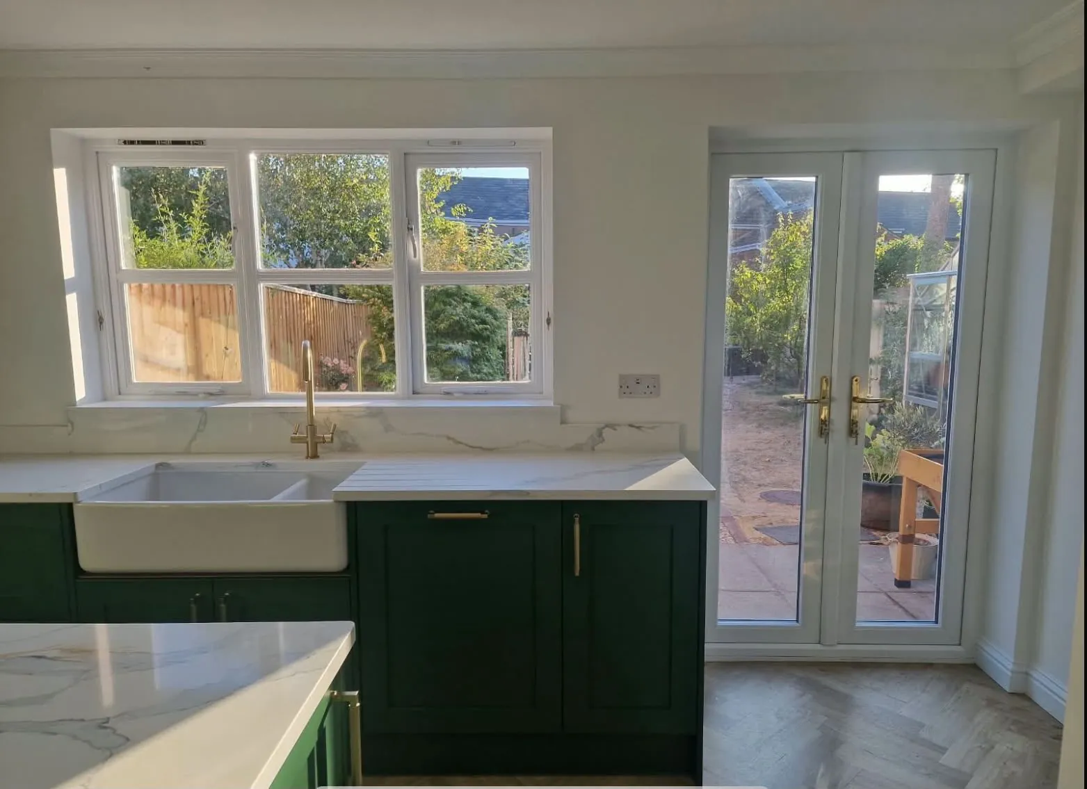 Green shaker kitchen belfast sink after – kitchen fitting by JCK Carpentry & Building, Exeter
