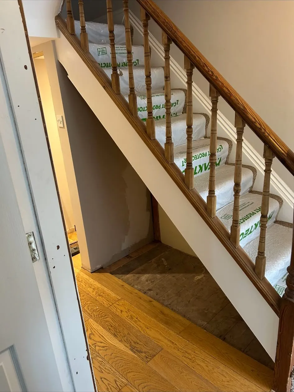 Under-stairs drawers in Exeter before work by JCK Carpentry & Building
