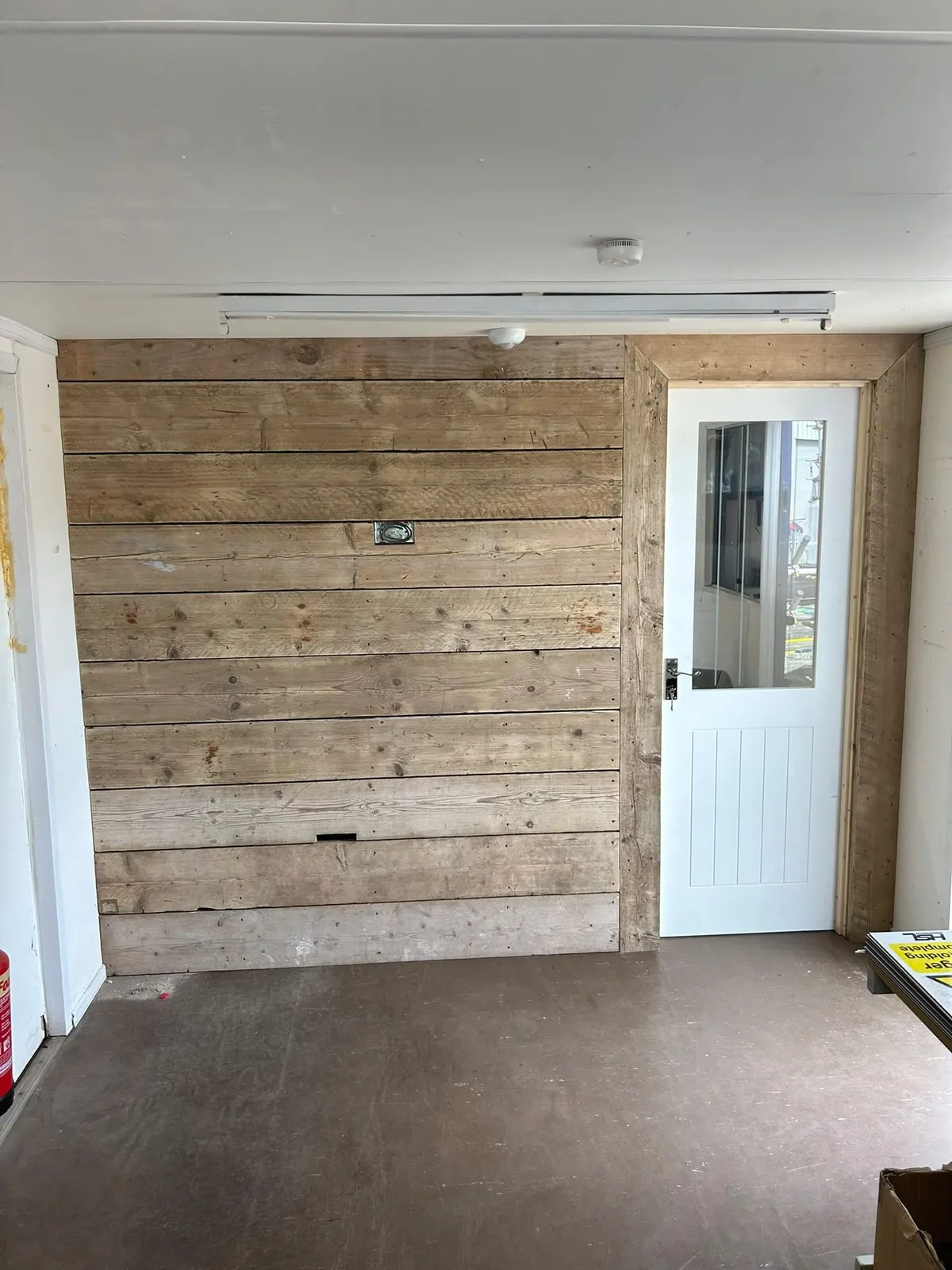 Reclaimed timber wall cladding – carpentry by JCK Carpentry & Building, Exeter